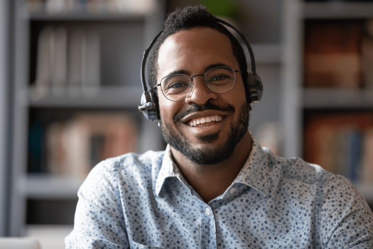 Happy Customer Support Specialist Helping a Tech Startup Succeed