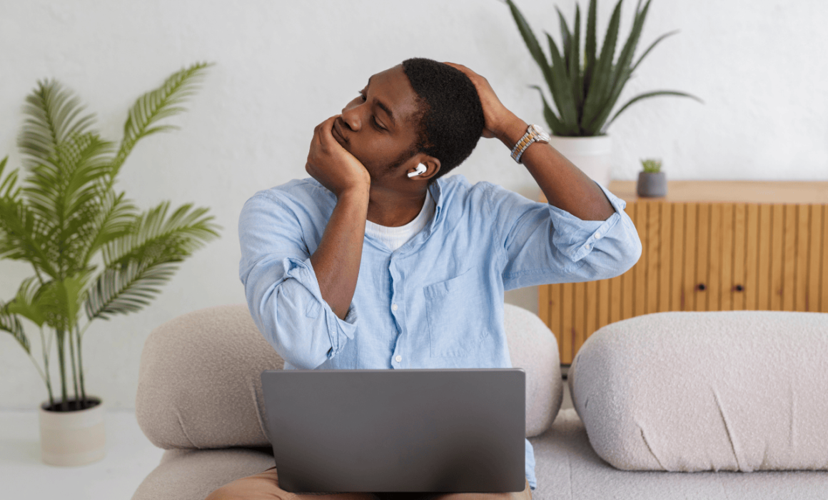A remote worker taking a break to manage stress and prevent burnout