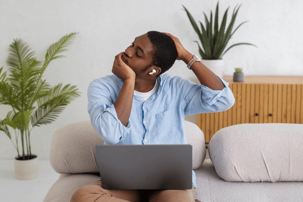A remote worker taking a break to manage stress and prevent burnout