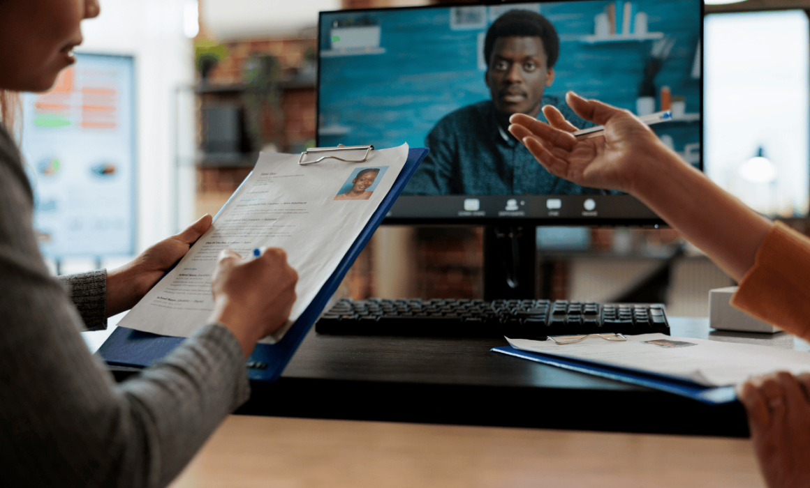 "Remote team collaborating online with Arwana's seamless hiring process.