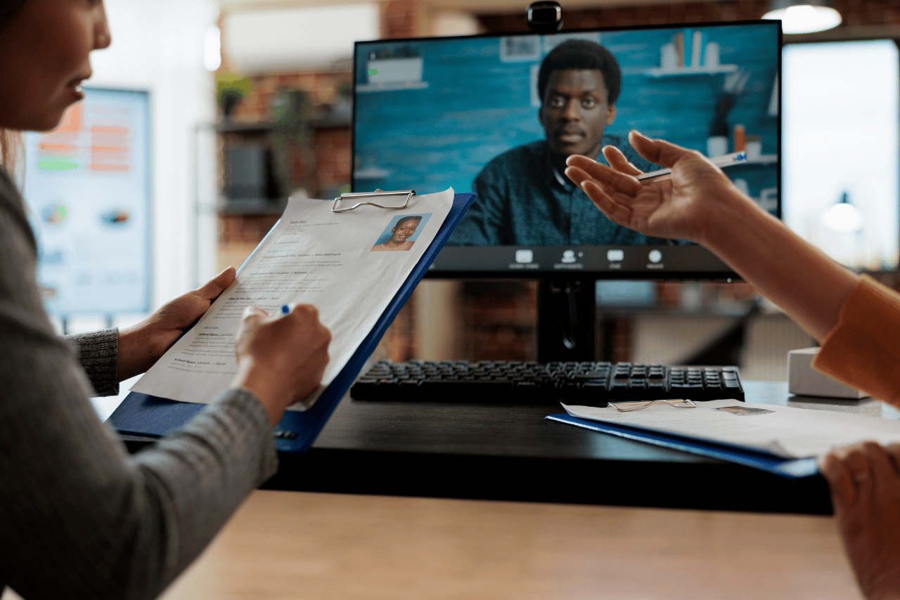"Remote team collaborating online with Arwana's seamless hiring process.
