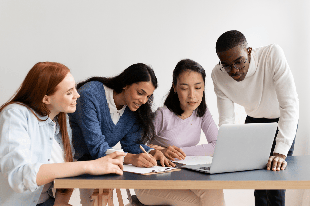 Remote employees engaging in virtual learning and development through online training and collaboration tools.