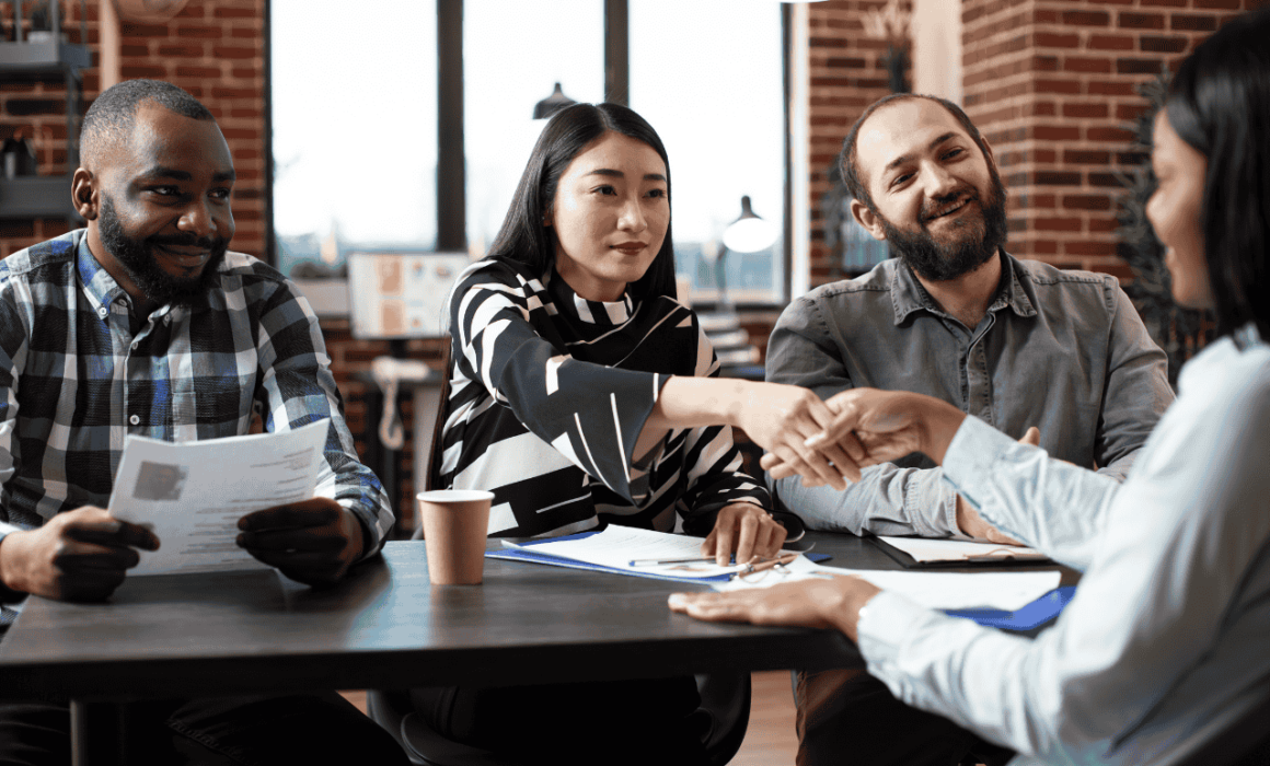 business owner shaking hands with new offshore hire